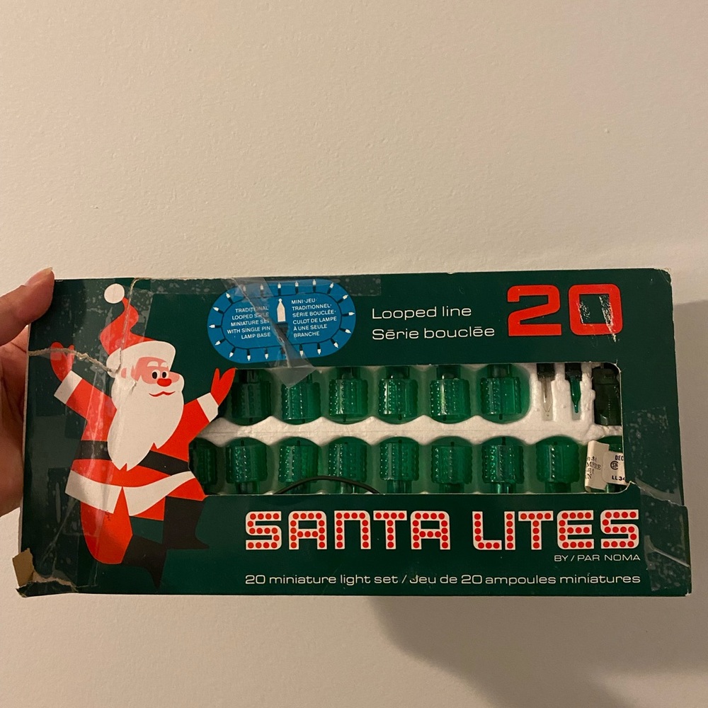 Vintage Christmas miniature string lights with green plastic light reflectors